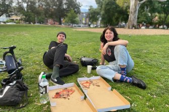 Cole Orr and Chelsea Davis enjoy a pizza at Edinburgh Gardens as they look forward to the end of lockdown.