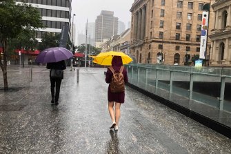 Umbrellas are taking a beating in Brisbane City.
