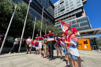 Djokovic supporters outside the Federal Court in Melbourne on Sunday.
