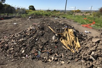 Discarded soil in Hume. Such waste must be treated and filtered once it is removed.