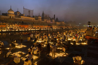 More than 900,000 earthen lamps are kept burning for 45 minutes on the banks of the river Saryu in Ayodhya, India, as part of Diwali celebrations on Wednesday evening for the city to retain a Guinness World Record.