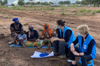 UNHCR’s Assistant High Commissioner for Protection Gillian Triggs (right) holds a focus group discussion with women at the Nanjua B internally displaced persons relocation site in northern Mozambique.