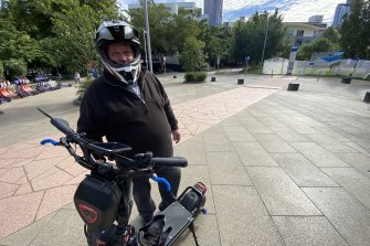 Well-prepared e-scooter rider Peter Newcomb from Moorooka says 25km/h on shared paths is a good compromise.