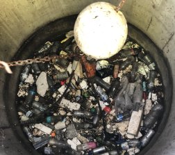 Rubbish trap on stormwater to stop pollution running into rivers.