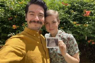 Australian citizens Emilio (left) and Dylan Polanco fear being stranded without insurance or jobs with a new baby if they lose their flight home.