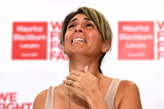 Westpac client Michelle Tate becomes emotional during a press conference at the offices of law firm Maurice Blackburn in Brisbane in February last year. Mrs Tate and her husband Ian were the lead litigants in the first class action against a big four bank after the publication of the Hayne Royal Commission Report. 
