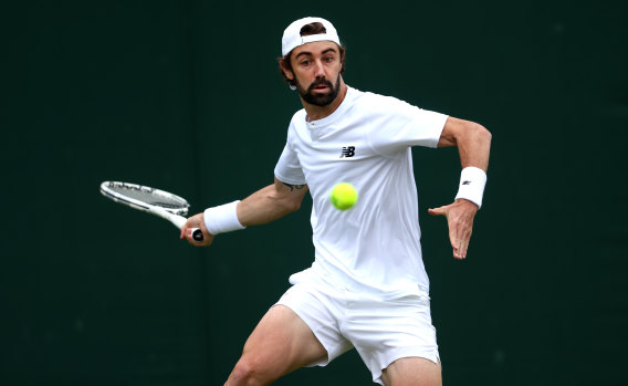 Jordan Thompson is into the second round at Wimbledon after a gutsy fightback.