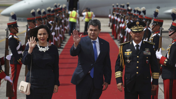 Honduras' President Juan Orlando Hernandez, centre, and his wife Ana Rosalinda Garcia Caria in Guatemala earlier this month.