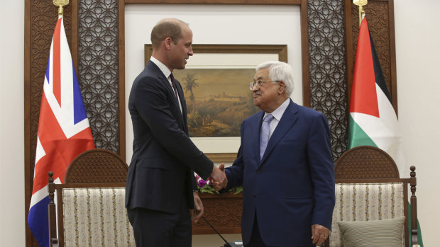 Prince William meets Palestinian President Mahmoud Abbas in the West Bank City of Ramallah on Wednesday.