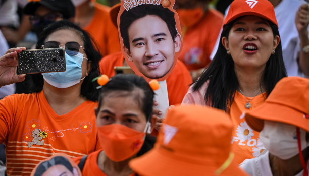 Move Forward supporters gather outside parliament on Thursday.