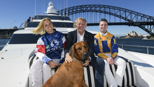 Sofia Arvidsson and Cameron Hart join John Singleton for the launch of the Eureka harness racing event.