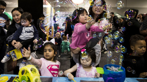 Children attend Play World held at the International Convention Centre in Sydney on the first weekend of the NSW school holidays.