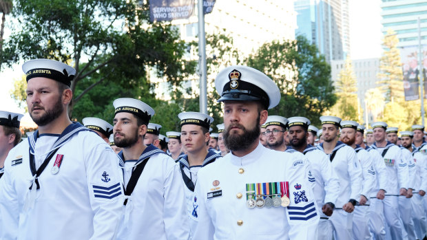 Navy servicemen take part in the Anzac Day March.