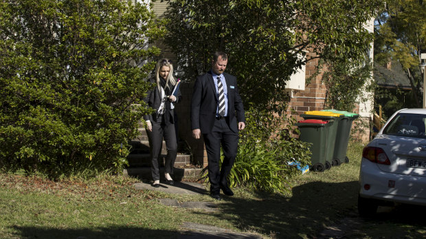 Detectives leave the house where Jack and Jennifer Edwards were murdered by their father, John Edwards, in 2018.  