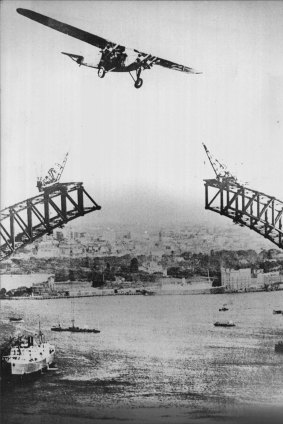 The Southern Cross flying over Sydney, 1932.