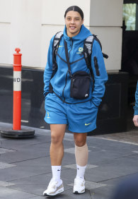 Sam Kerr leaves the Matildas’ team hotel in Sydney on Friday morning with a compression bandage on her left calf.