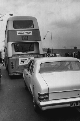 The police car escorting the bus along Anzac Parade. June 2, 1971.