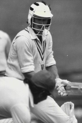 John Dyson wearing an early model helmet during a Sheffield Shield match in 1980.