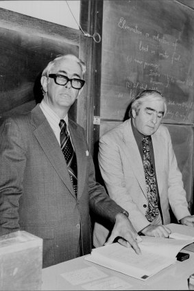 Professor Lloyd Smythe (left) and Dr Ronald Freeman discussing their report on the lead burden on Sydney school children.
