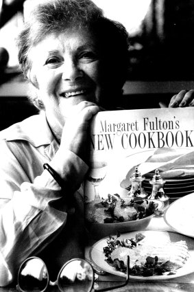 Margaret Fulton with one of her 20 cookbooks.