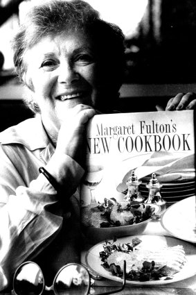 Fulton with one of her 20 cookbooks.