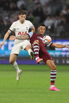 Ben Davies of Hotspur and Gianluca Scamacca of West Ham contest for the ball.