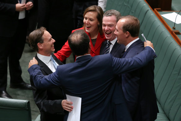 As the former environment minister celebrating the lower house’s 2014 repeal of Labor’s “carbon tax”. 