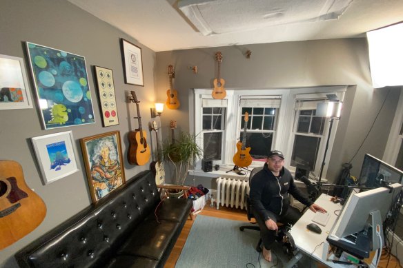 Podcaster and songwriter Jonathan Mann of ‘Song a Day’ in his home studio.