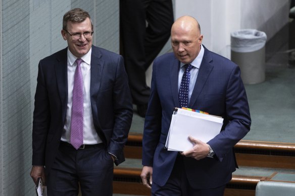 Alan Tudge and Opposition Leader Peter Dutton arrive for question time today.
