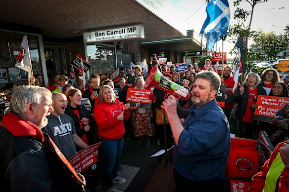 Australian Education Union president Justin Mullaly addresses teacher protesting outside the office of Education Minister Ben Carroll in Niddrie last month.