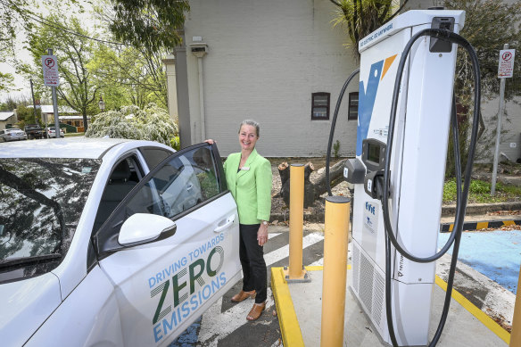 Indigo Shire tourism manager Susannah Doyle at the electric charger in Beechworth. 