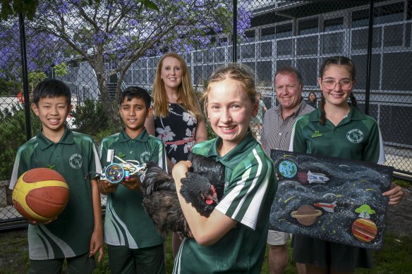Oakleigh South Primary School acting principal Nikki Virtuoso (back, left) and assistant principal Erik Albers with students (from left) Masaki, Prayag, Evelina and Deanna.