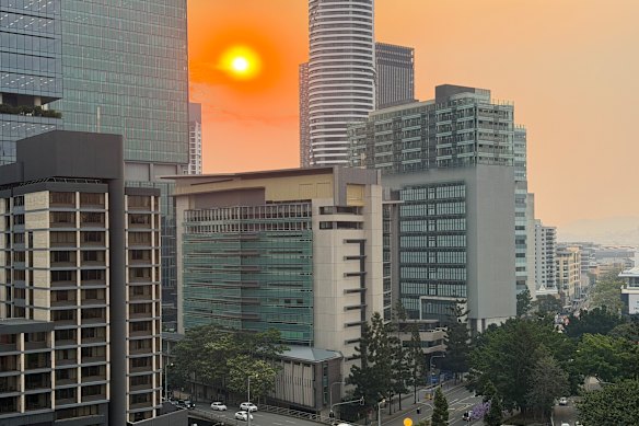 The hazy, orange Brisbane sunset on Monday.