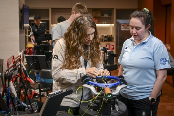 Priscilla Mendes (left) and Sarah Bloomfield working on a racquet. 