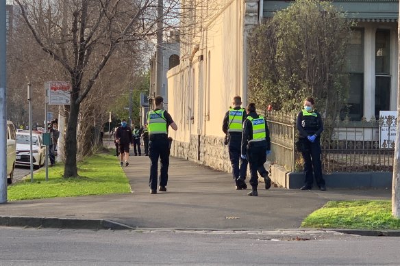 Police guarded the front and back entrances of the residence to ensure the man does not leave.