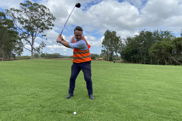 Brisbane lord mayor Adrian Schrinner in the swing of things on the 13th at Brisbane’s new Minnippi Golf Course.