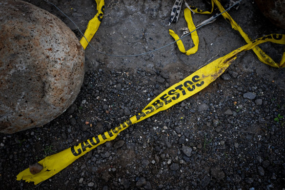 Asbestos remains among the dumped spoil in critically endangered grasslands in Truganina. 