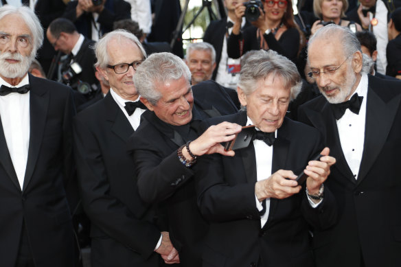 Previous former Palme d'or winners from left, Michael Haneke, Ken Loach, Claude Lelouch, Roman Polanski and Jerry Schatzberg at the 70th Anniversary of the film festival, Cannes, southern France in 2017.