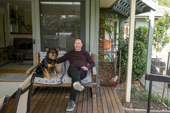 Retiree Trevor Molloy, pictured with his dog Ellie, is selling his Vermont South home of 20 years to purchase a smaller property by the beach.