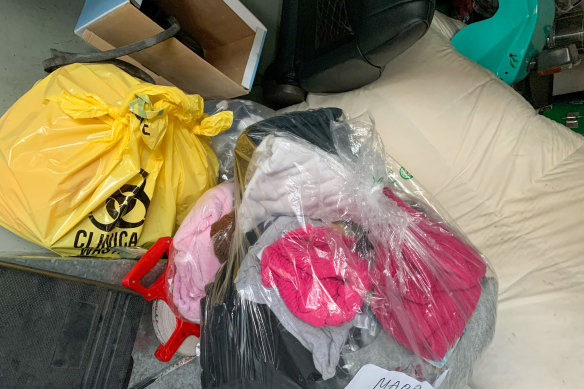 Some of the bags of belongings sent to Maureen O'Brien's family, along with a bag marked "clinical waste".