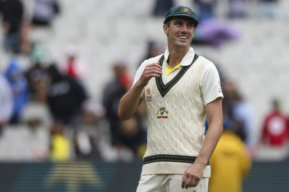 Australia’s Pat Cummins leads the Australian team off the field after victory at the MCG in the Boxing Day Test.