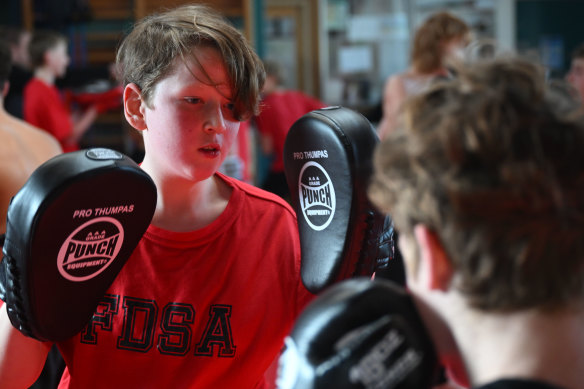 Sasza, one of the students at the Frank Dando Sports Academy in Ashwood during a boxing session in school time.