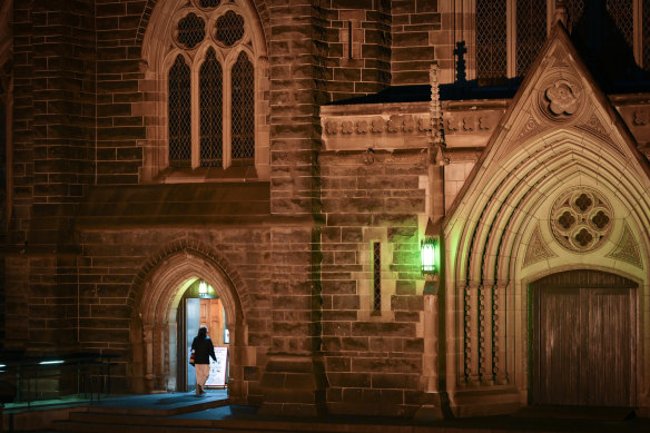 A worshipper enters St Patrick’s Cathedral on Wednesday night.