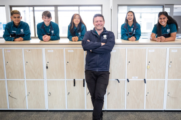 Cranbourne West Secondary year seven students Juan, Lachlan, Angel, Alice and Alexia with principal Rob Duncan.