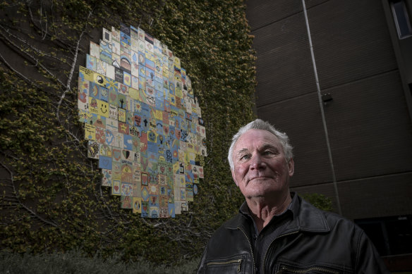 Lee Gordon-Brown in front of the Monash shooting commemorative mural.