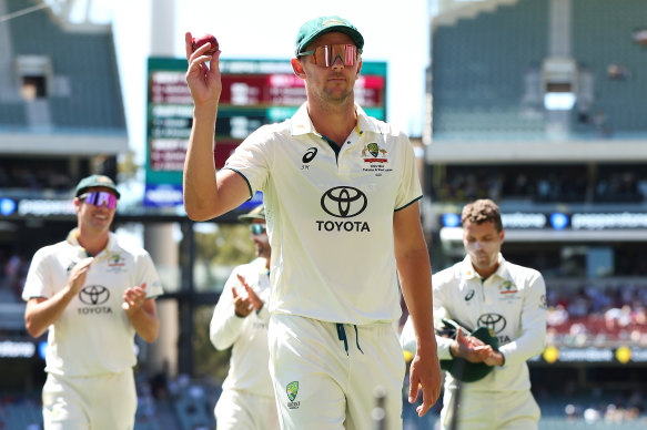 Josh Hazlewood walks off the Adelaide Oval after claiming nine West Indian wickets.