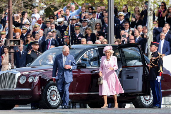 King Charles III and Queen Camilla arrive at a ceremonial welcome at the Arc de Triomphe in Paris on Wednesday.