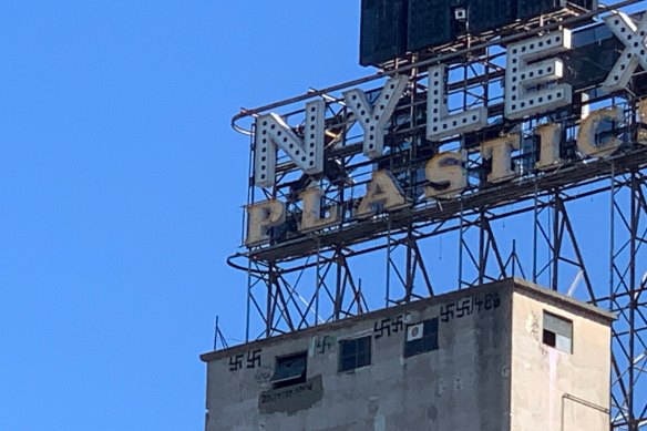 Swastikas seen on the Nylex building.