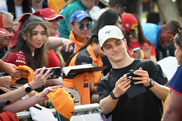 F1 driver Oscar Piastri meets fans at the Melbourne Walk in 2025.