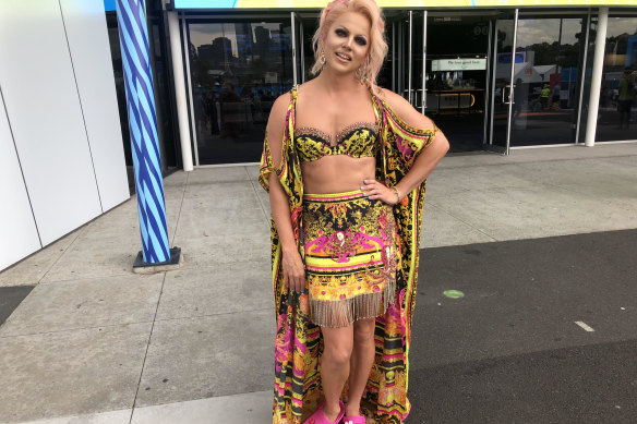 Courtney Act at the tennis on Thursday.